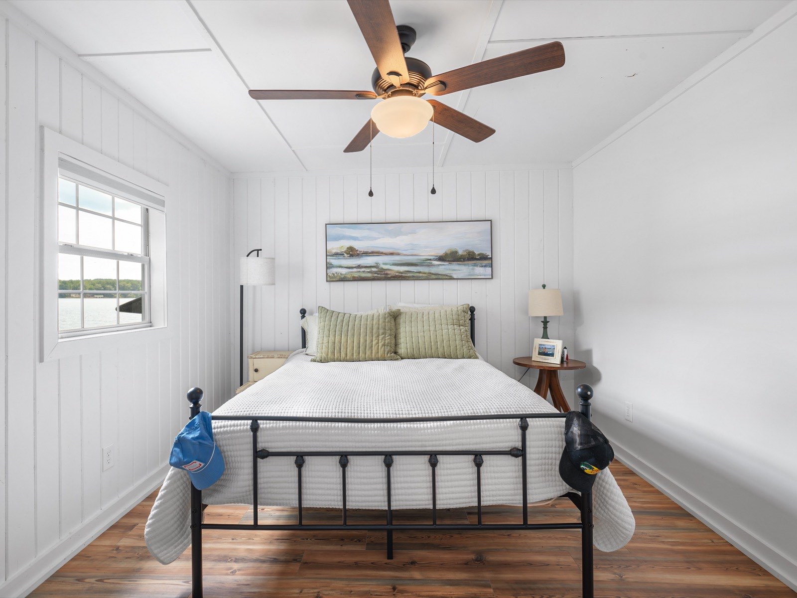 Bedroom remodel with lake views by Q&A Construction