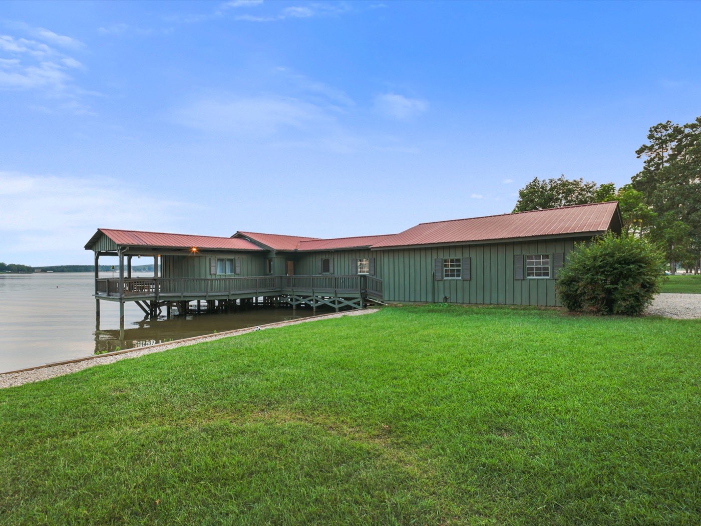 Exterior painted waterfront home by Q&A Construction in Meridian, MS