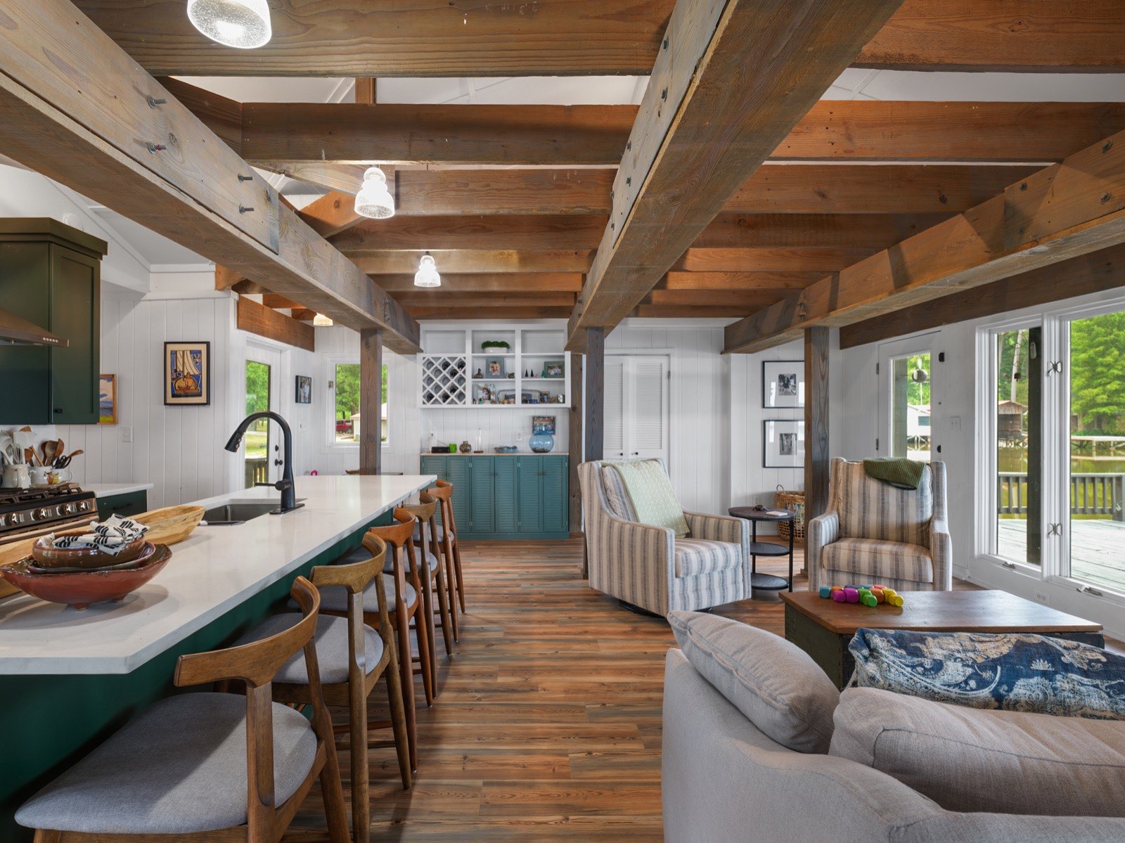 Open-concept kitchen and living remodel by Q&A Construction in Meridian, MS